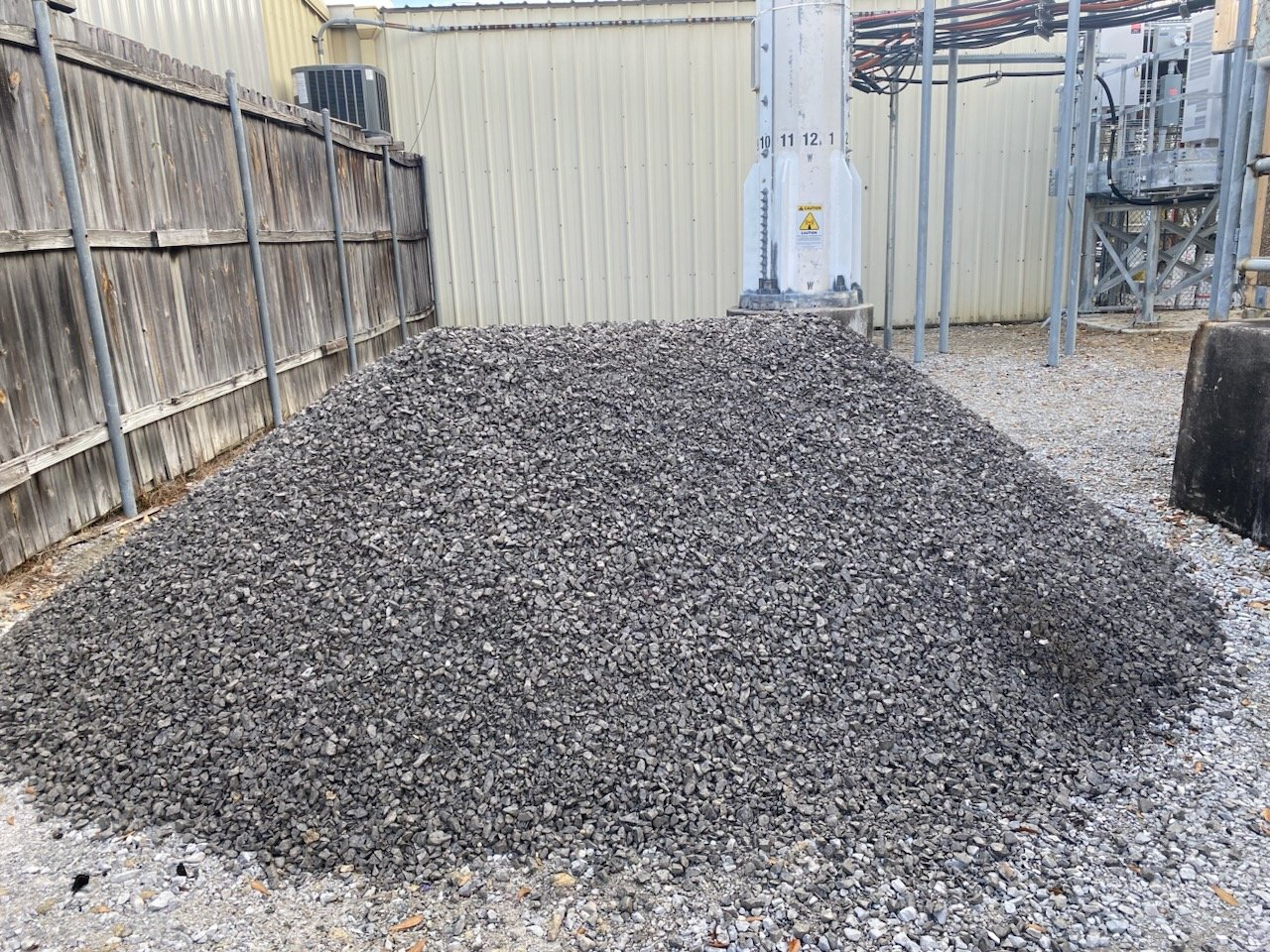 Material spreading on job site