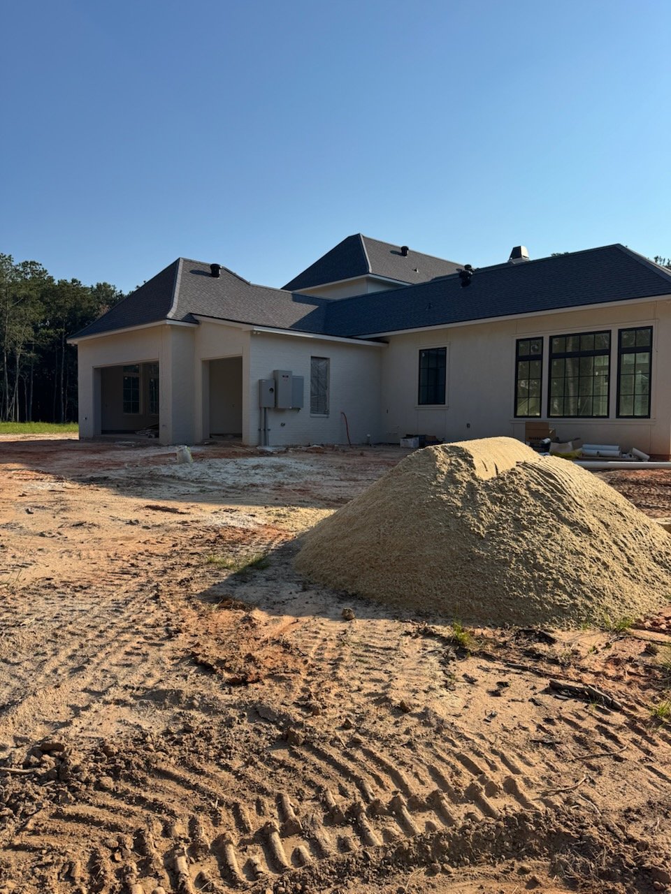 Jefferson Sand and Gravel delivering bulk materials to a residential site