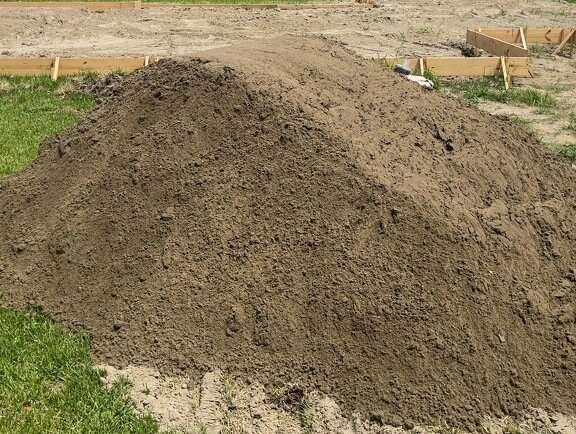 Topsoil pile delivered for landscaping