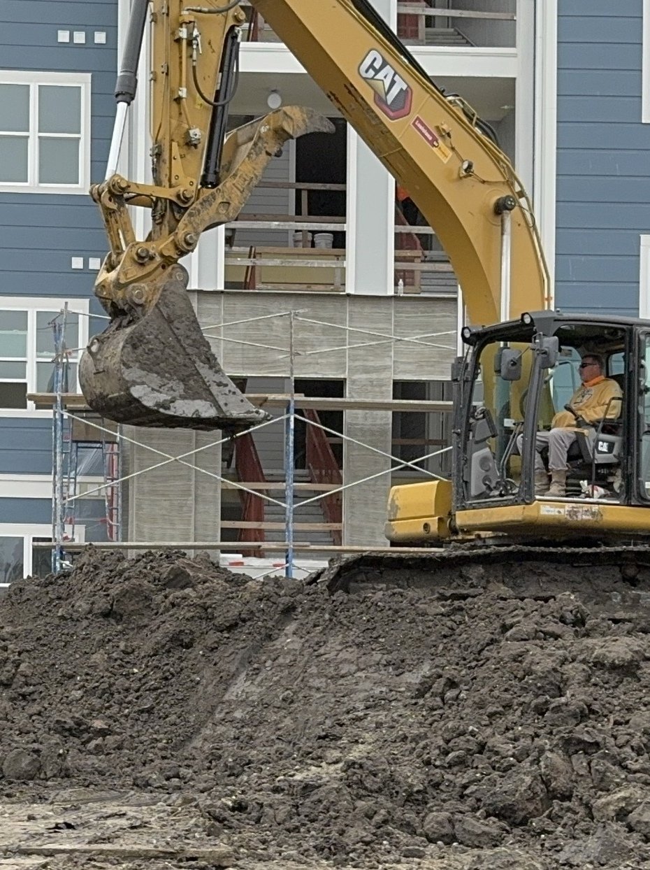 Grading equipment on job site